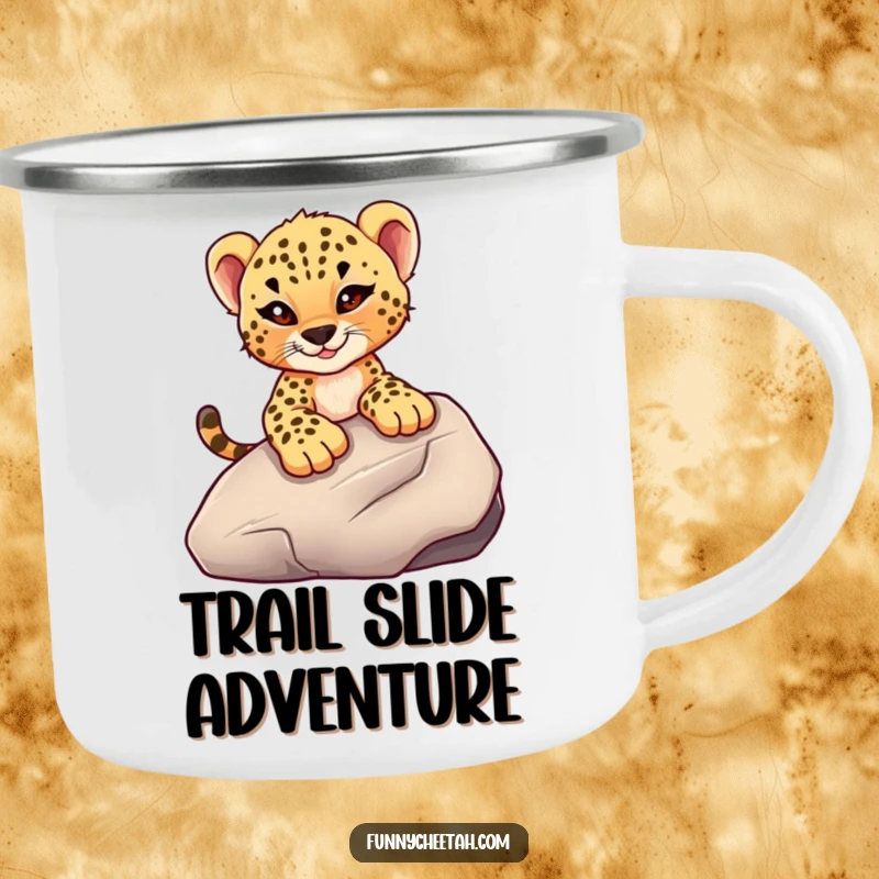 Funny camping mug showing a cheetah cub with a mischievous wink sliding down a smooth rock, ideal for outdoor enthusiasts who love adventure.