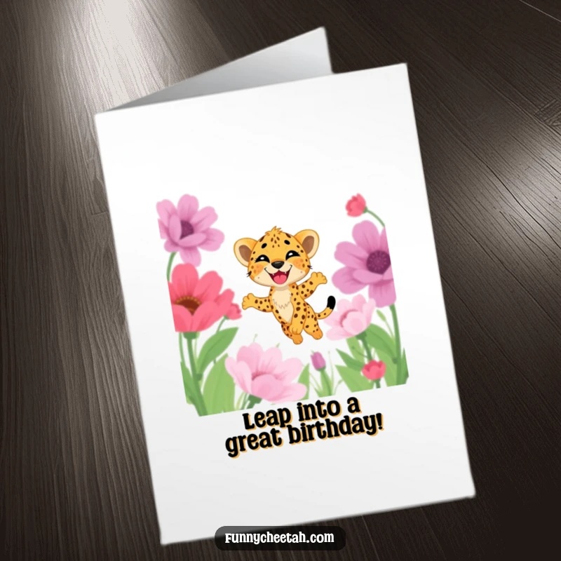 Funny Free Printable Cheetah Cub Birthday Card: Cub with a delighted grin leaps through oversized flowers, celebrating joyfully.