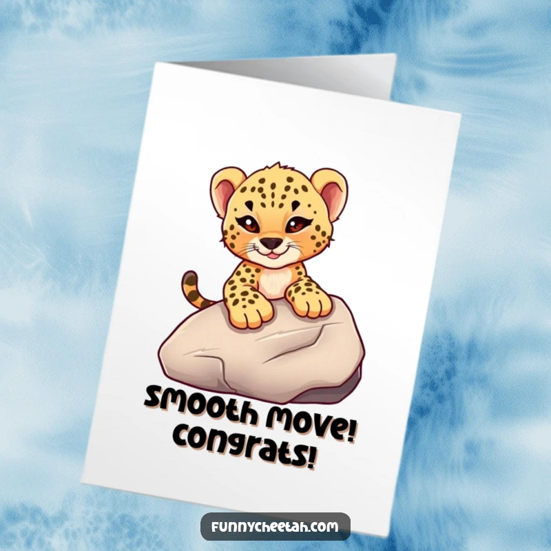 Funny Free Printable Cheetah Cub Congratulations Card: Cub with a mischievous wink slides down a large rock, celebrating boldly.