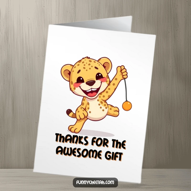 Funny Free Printable Thank You Card: A cheetah grins widely, leaping enthusiastically towards a tempting dangling toy.