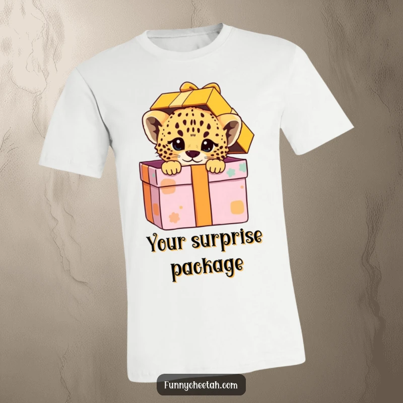 Funny T-shirt featuring a cheetah cub peeking out from an oversized, colorful gift box with a mischievous and playful expression, ready for fun.